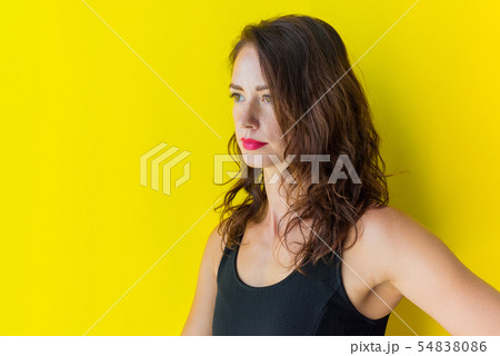 Young woman in black gress mourns. Human emotions 54838086