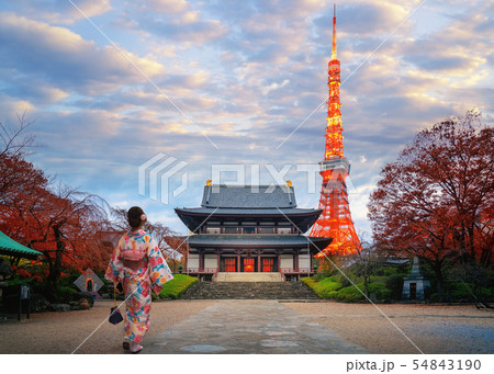 Japanese women in kimono dress walk in Zojoji 54843190