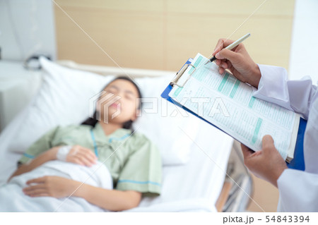 Doctor record health check data to report paper in 54843394