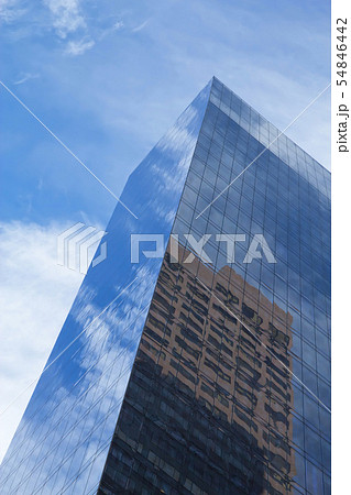 Modern skyscrapers with clouds reflection. Modern skyscrapers with clouds reflection. 54846442