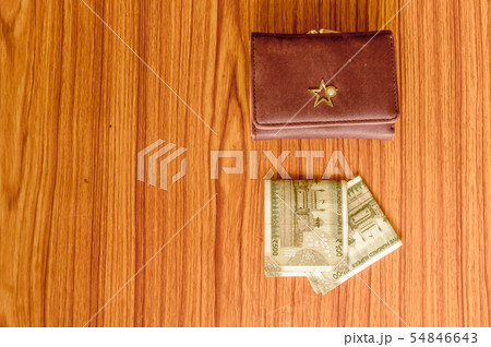 Indian Currency rupee cash note in leather wallet 54846643