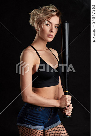 serious fit girl is ready to play baseball serious fit girl is ready to play baseball 54847563