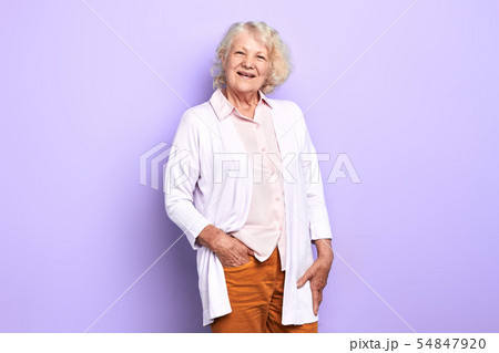 talented female doctor with a hand on her pocket looking at camera. 54847920