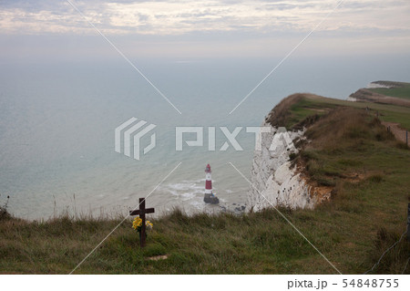 White chalk cliffs and Beachy Head Lighthouse. Eastbourne, East Sussex, England. Highest chalk sea White chalk cliffs and Beachy Head Lighthouse. Eastbourne, East Sussex, England. Highest chalk sea 54848755