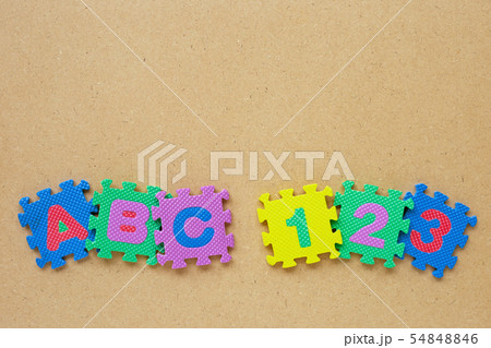 Alphabet puzzle with number puzzle on wooden 54848846