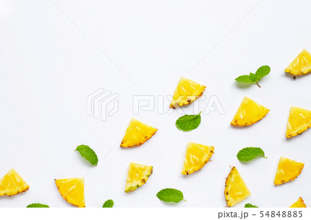 Summer fruit. Sliced pineapple on white. Copy 54848885