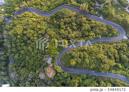 Asphalt road curve on high mountain image by Drone Asphalt road curve on high mountain image by Drone 54849172
