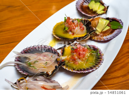 fresh scallops new peruvian cuisine style 54851061