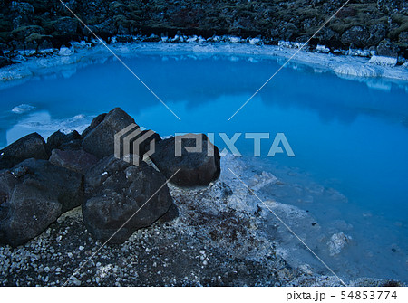 The water of the Blue Lagoon surrounded by rocks The water of the Blue Lagoon surrounded by rocks 54853774