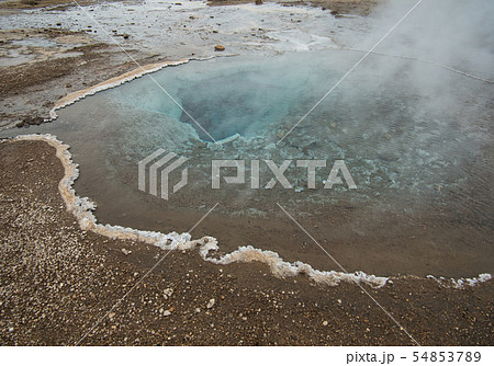 The crystal clear water from a geothermal spring 54853789
