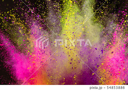 Colored powder explosion on black background. Colored powder explosion on black background. 54853886