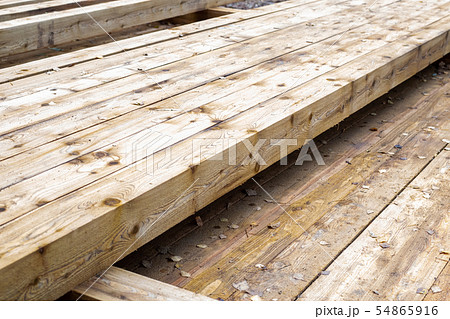 row long beige planks timber knot pattern sawmill 54865916