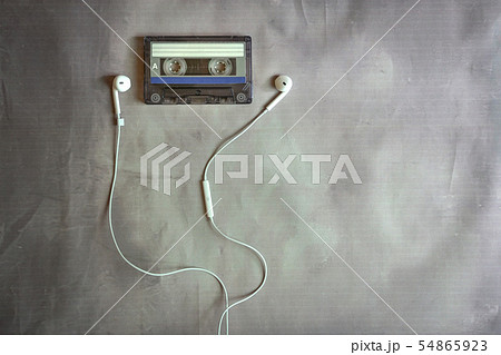 Old cassette with ear phones Old cassette with ear phones 54865923