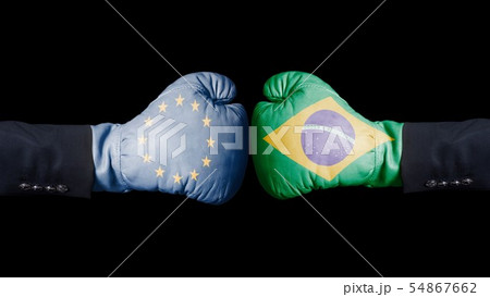 Boxing gloves with European Union and Brazil flag. Boxing gloves with European Union and Brazil flag. 54867662