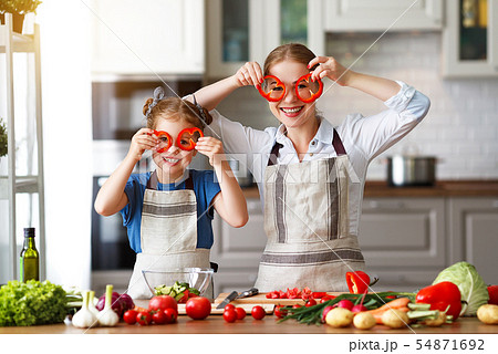 happy family mother with child girl preparing 54871692