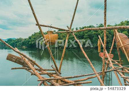 Ancient bamboo fish trap equipment of countryside, 54873329