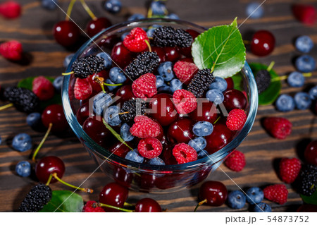 Summer, ripe berries in a transparent bowl 54873752
