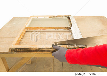 Close up of a person restoring sash window 54873808