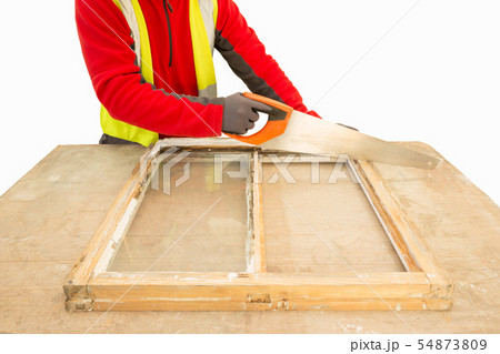 Close up of a person restoring sash window Close up of a person restoring sash window 54873809