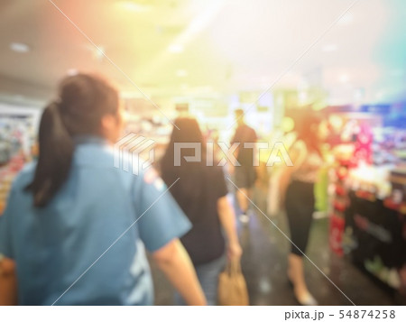 Blurred image of people shopping and walking in 54874258