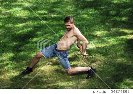 Man dancer of ballet or contemporary dance in park 54874895