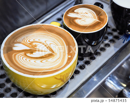 Cup of latte or cappuccino with latte art. 54875435
