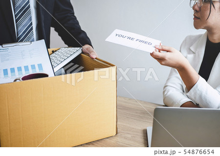 Stressed businessman receive fired letter from Stressed businessman receive fired letter from 54876654