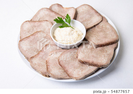 Beef boiled tongue with horseradish. Beef boiled tongue with horseradish. 54877657
