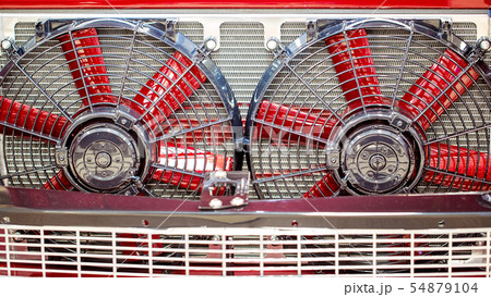 Close Up Of Radiator Fans Of Red Classic Car 54879104