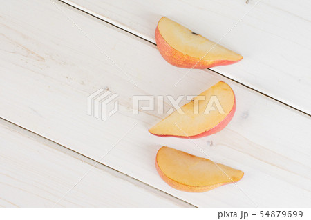 Anjou red pear on grey wood Anjou red pear on grey wood 54879699