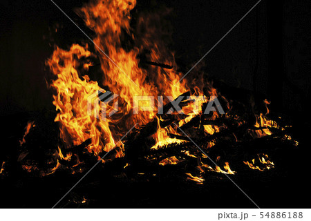 Bonfire with orange flames, Alibag, Maharashtra 54886188