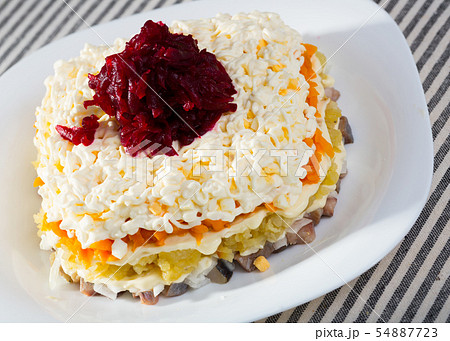 Dressed herring salad 54887723