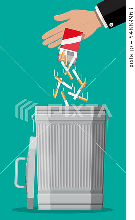Hand putting cigarettes package in trash bin 54889963