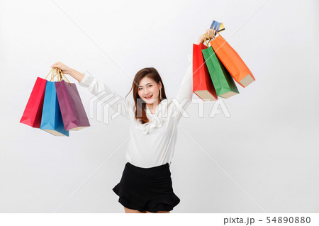 Portrait of beautiful woman holding shopping bags 54890880