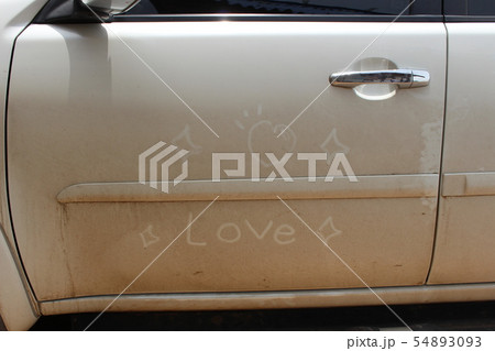 The car door has a heart shape and the word love 54893093