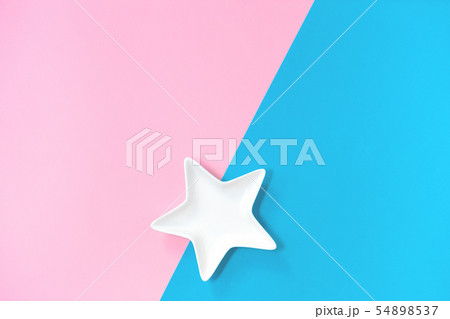Blue nonpareils cake sprinkles in star bowls 54898537