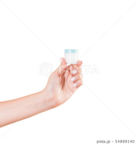 Female hand holding cream bottle of lotion Female hand holding cream bottle of lotion 54899140