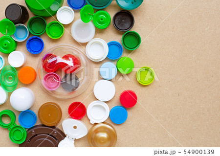 Colorful plastic bottle caps and plastic glass lid 54900139