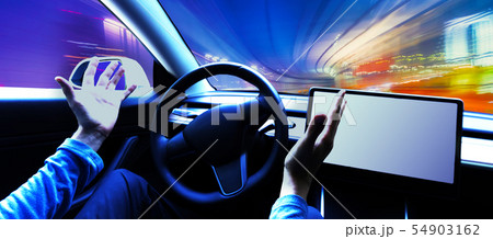 Person using a car in autopilot mode 54903162