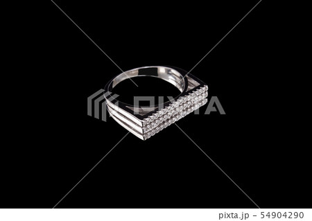 Ring with a lot of gems on a black background Ring with a lot of gems on a black background 54904290
