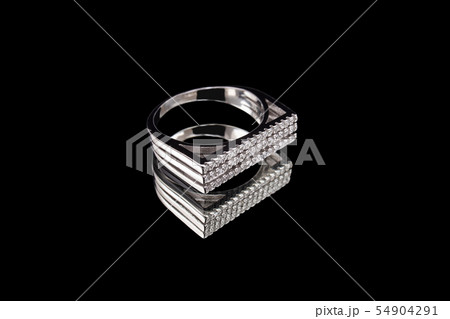 White gold ring with reflection on glass 54904291