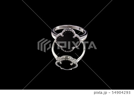 Ring with reflection on the black mirror 54904293