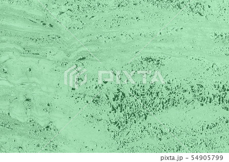Closeup of mint colored porous stone textured wall 54905799