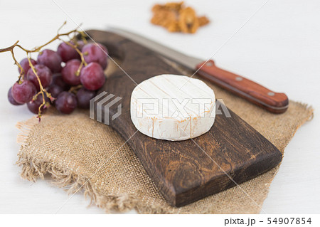 Blue cheese or brie with grapes and nuts Blue cheese or brie with grapes and nuts 54907854