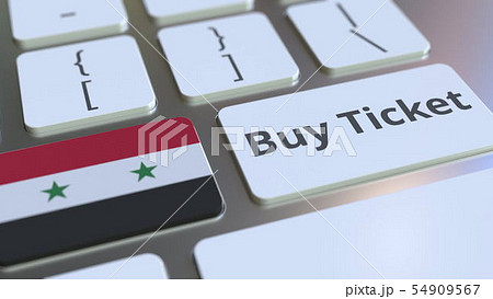 BUY TICKET text and flag of Syria on the buttons on the computer keyboard. Travel related conceptual 54909567
