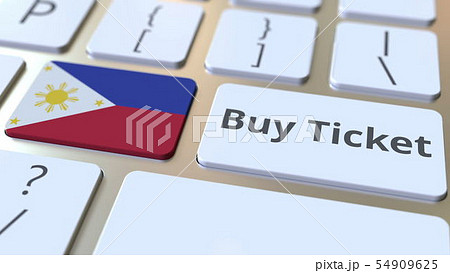 BUY TICKET text and flag of Philippines on the buttons on the computer keyboard. Travel related 54909625