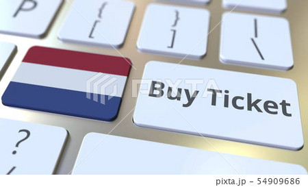 BUY TICKET text and flag of the Netherlands on the buttons on the computer keyboard. Travel related 54909686