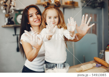 Family cook the dough for cookies 54913065