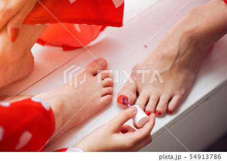 Cute mother and daughter at home in a pajamas 54913786