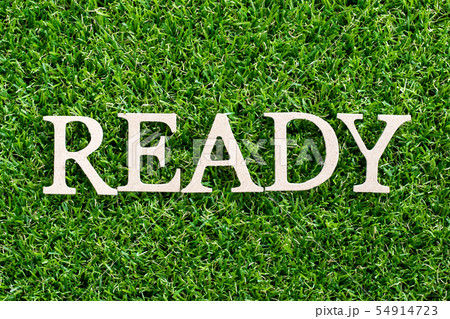 Wood letter in word ready on green grass Wood letter in word ready on green grass 54914723